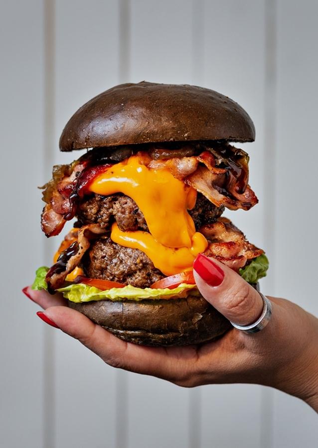 NO. THIS IS NOT FOOD CULTURE a huge, exaggerated bacon-and-cheese burger